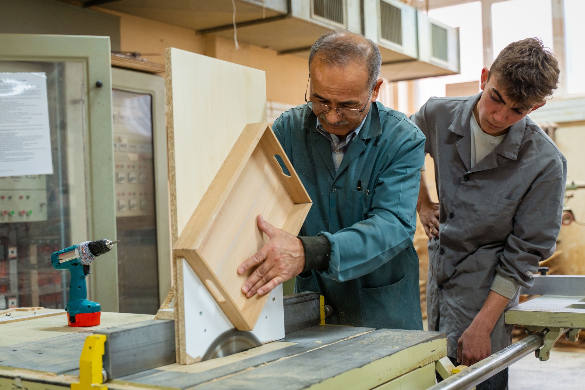 Carpentry Workshop With Students Studying For Apprenticeship At High School