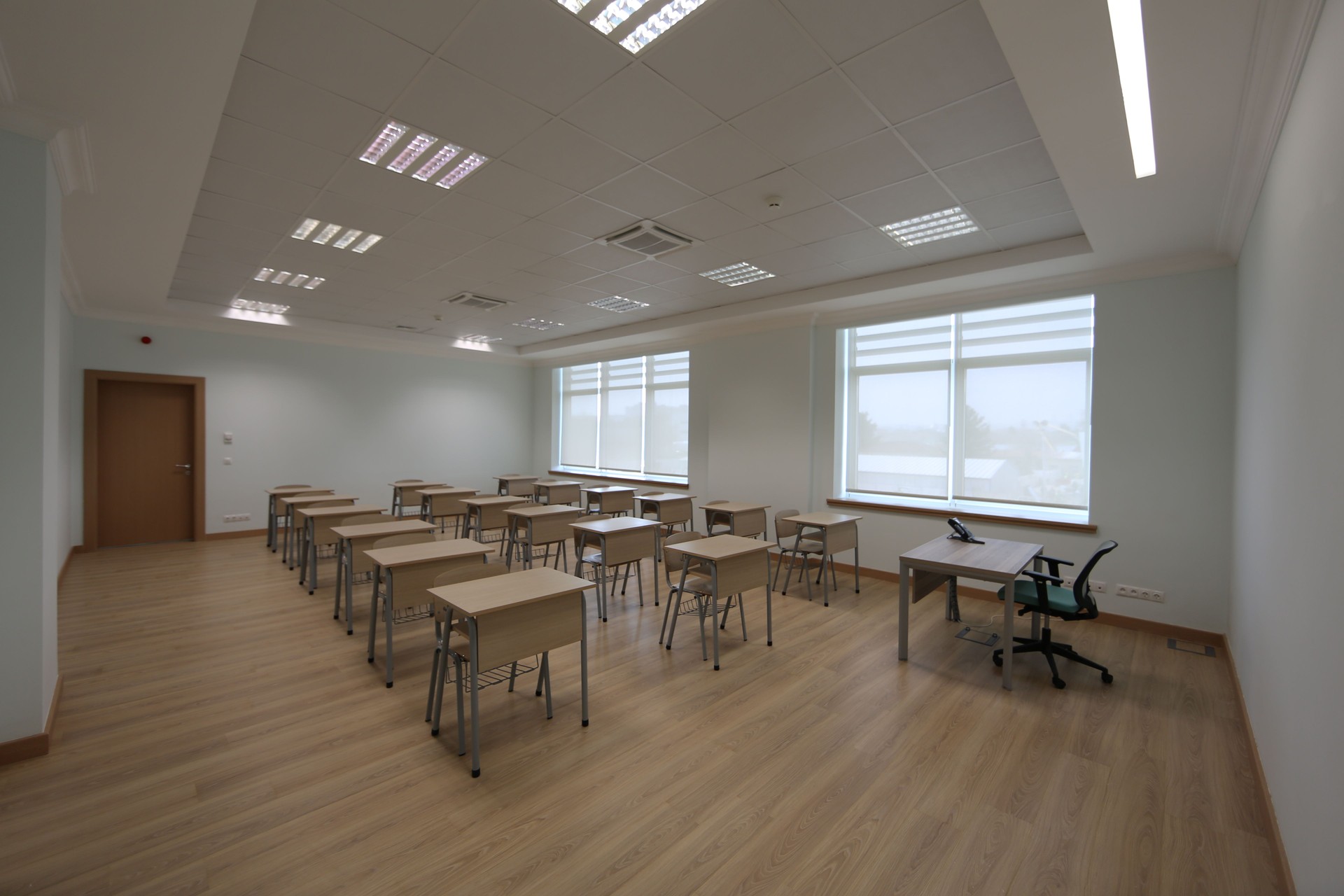 Empty classroom in closed school.